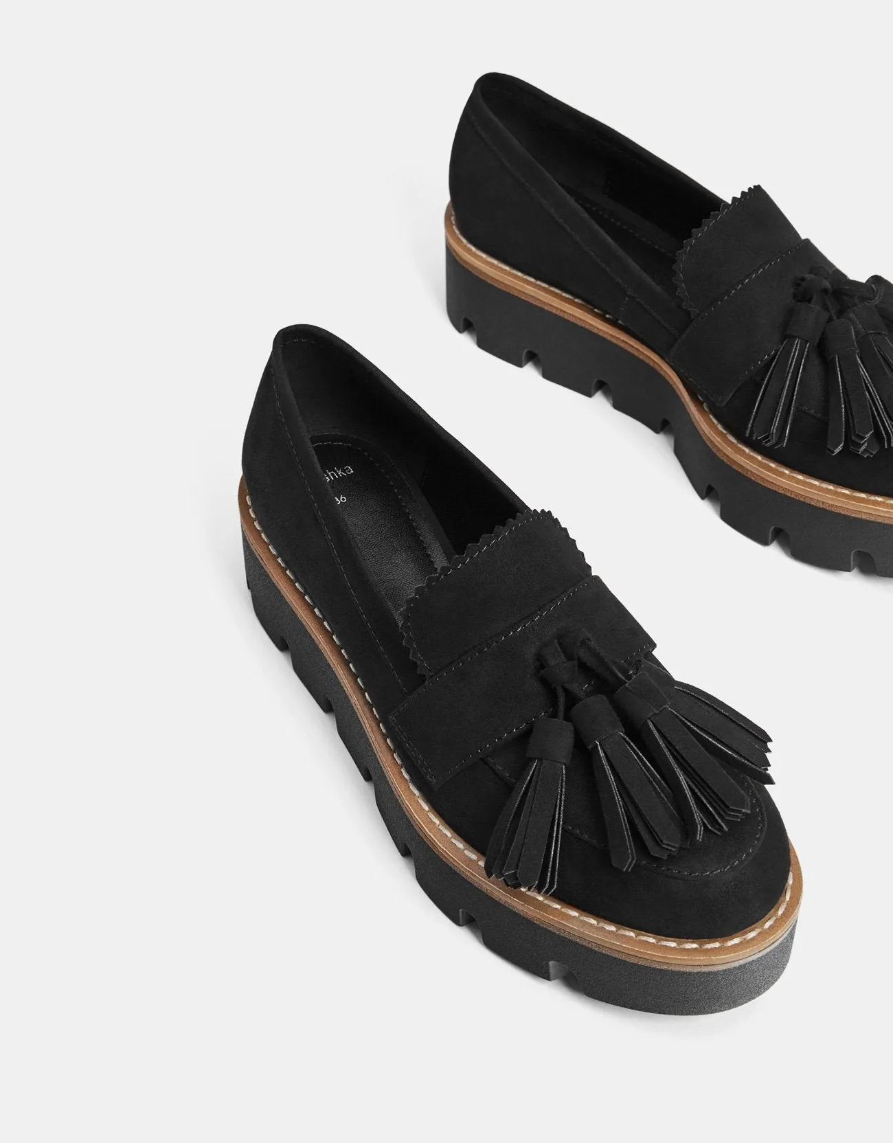 Platform loafers with tassels