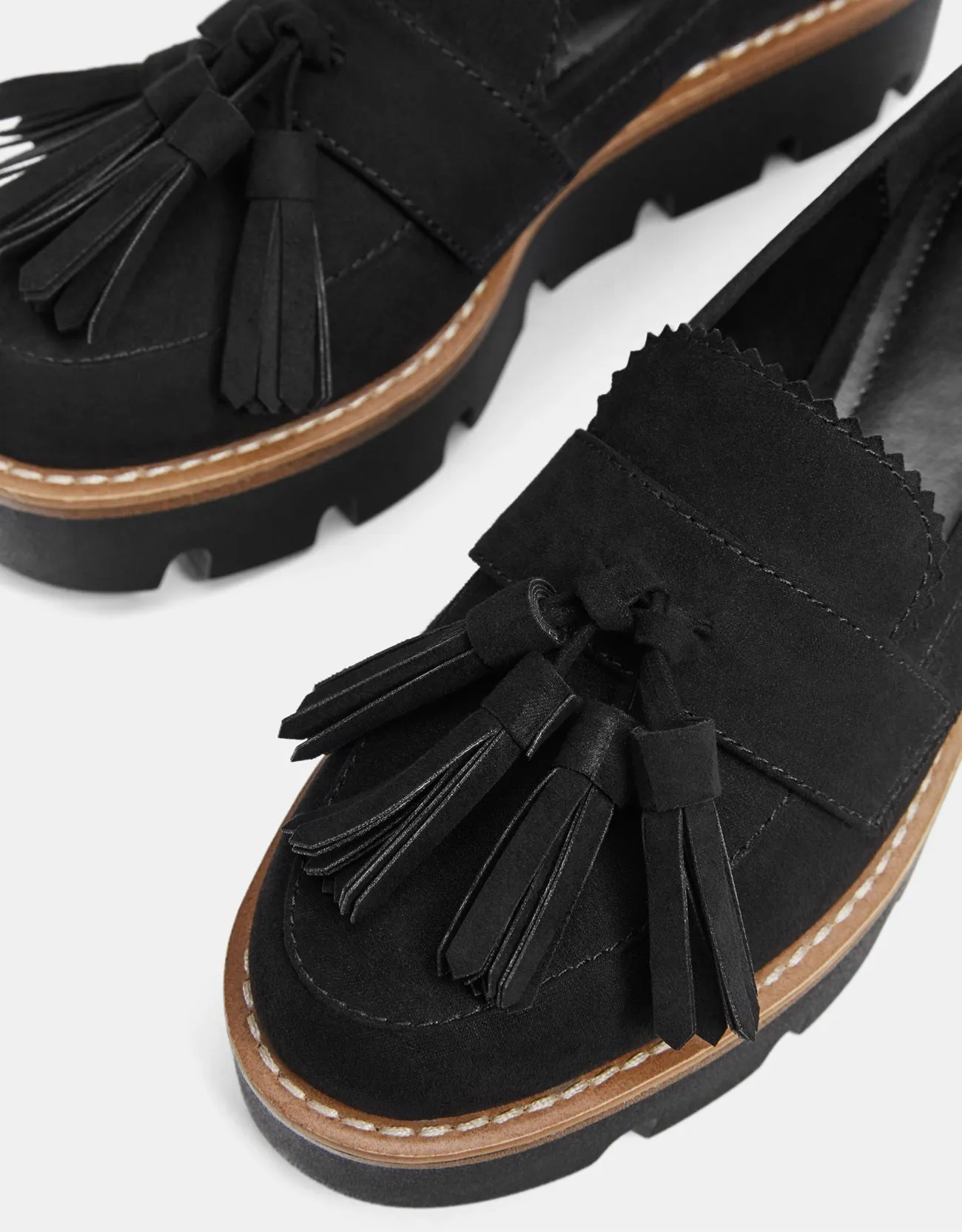 Platform loafers with tassels