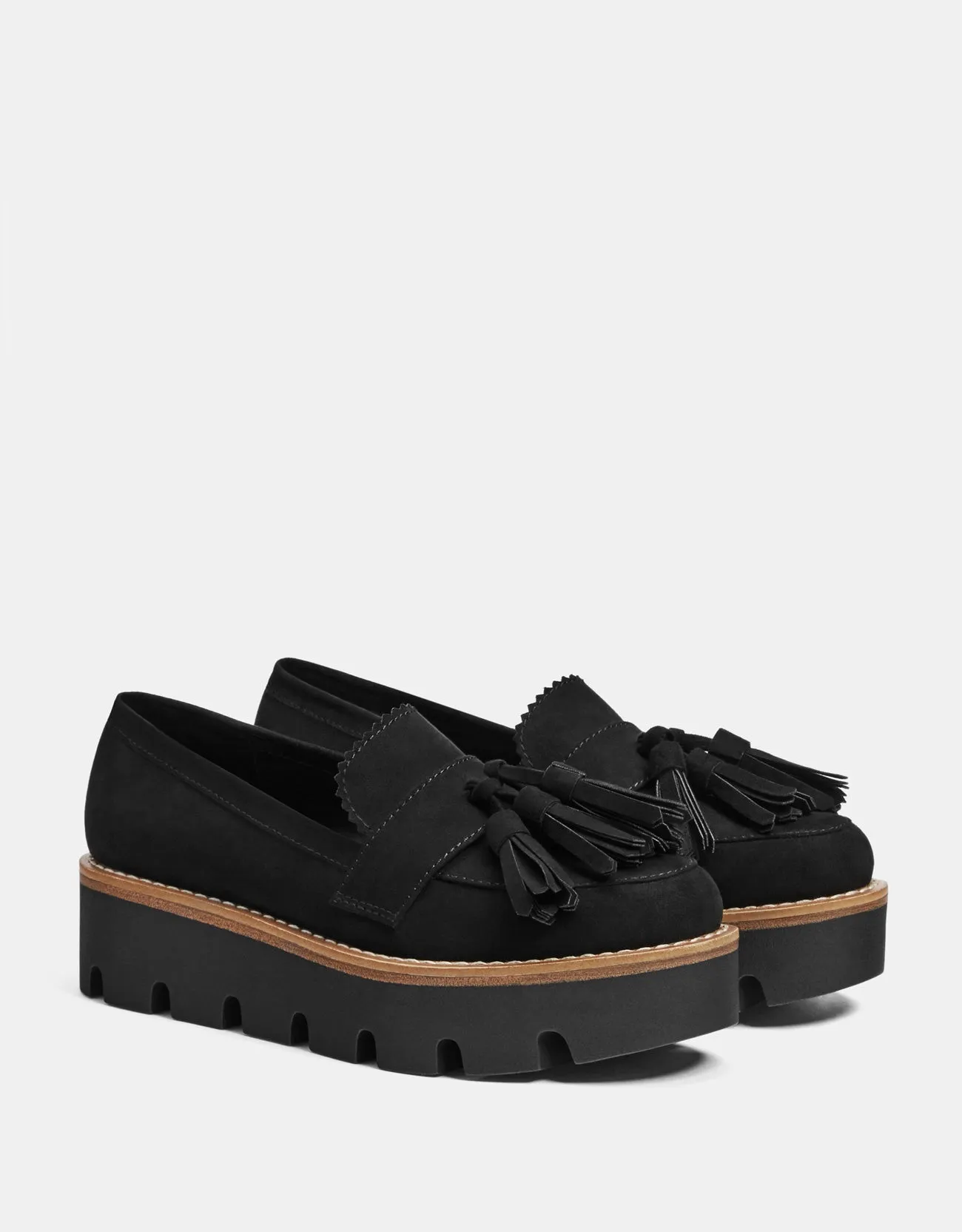 Platform loafers with tassels